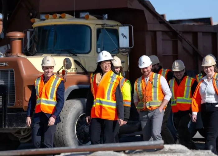 Group of employees walking on a construction site