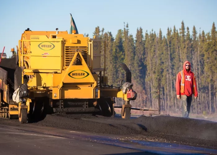 Crew completing paving work on the Highway 33 project
