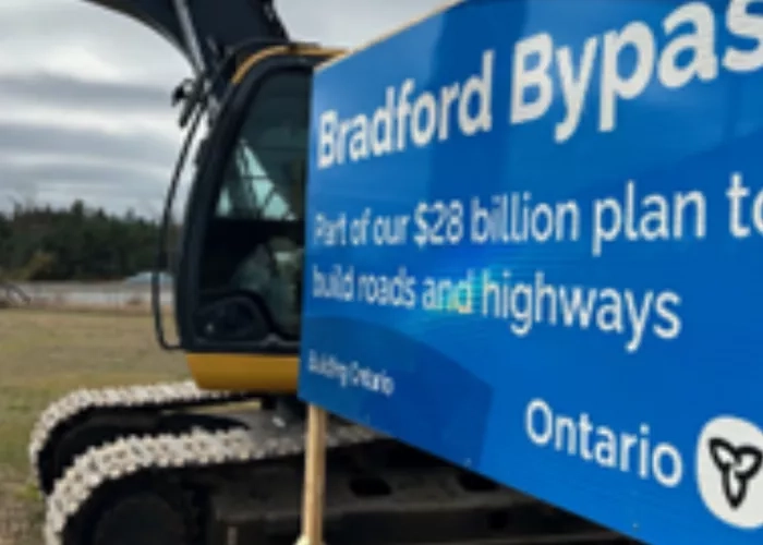 Ontario road sign promoting the launch of the Bradford Bypass project. 