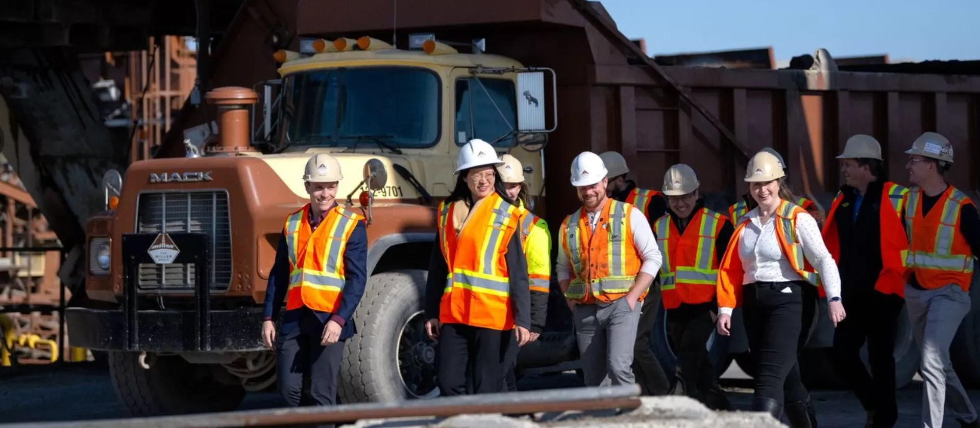 Group of employees walking on a construction site