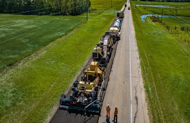 Cold-in-place recycling train completing work on the Highway 33 project in Alberta